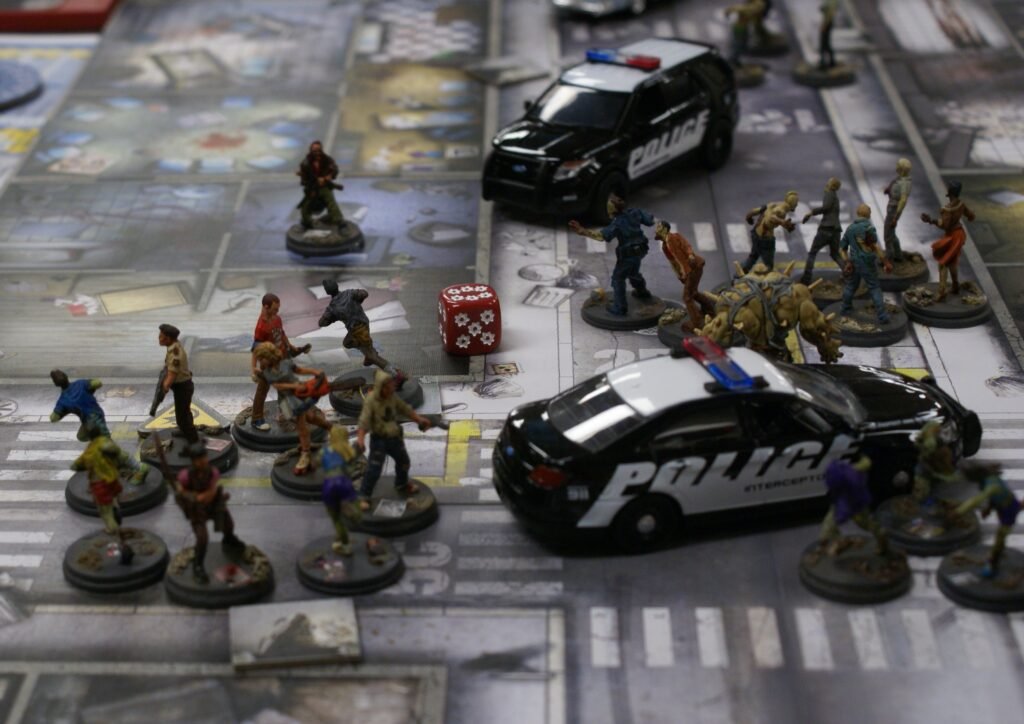 Detailed miniatures setup for the Zombicide board game during gameplay.