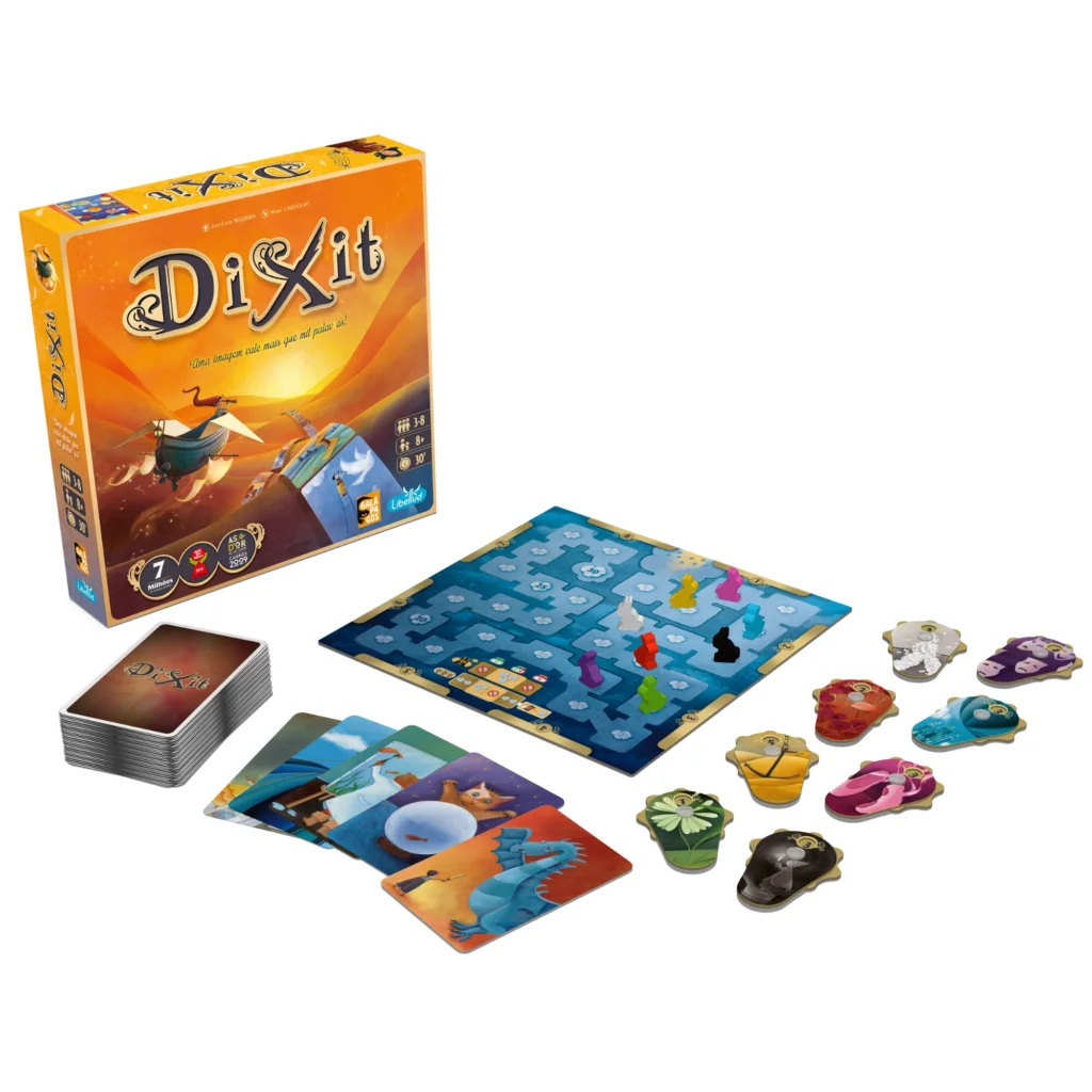 Colorful surrealist cards spread out during a round of the Dixit board game