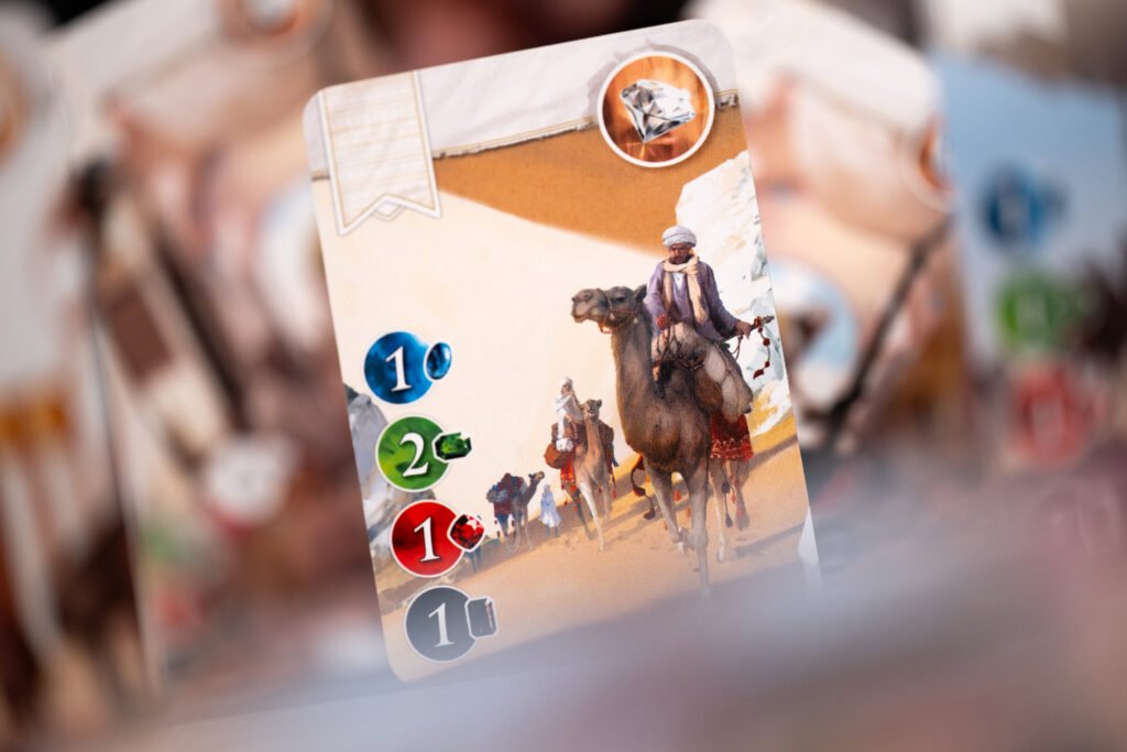 Splendor development cards and noble tiles laid out during a game